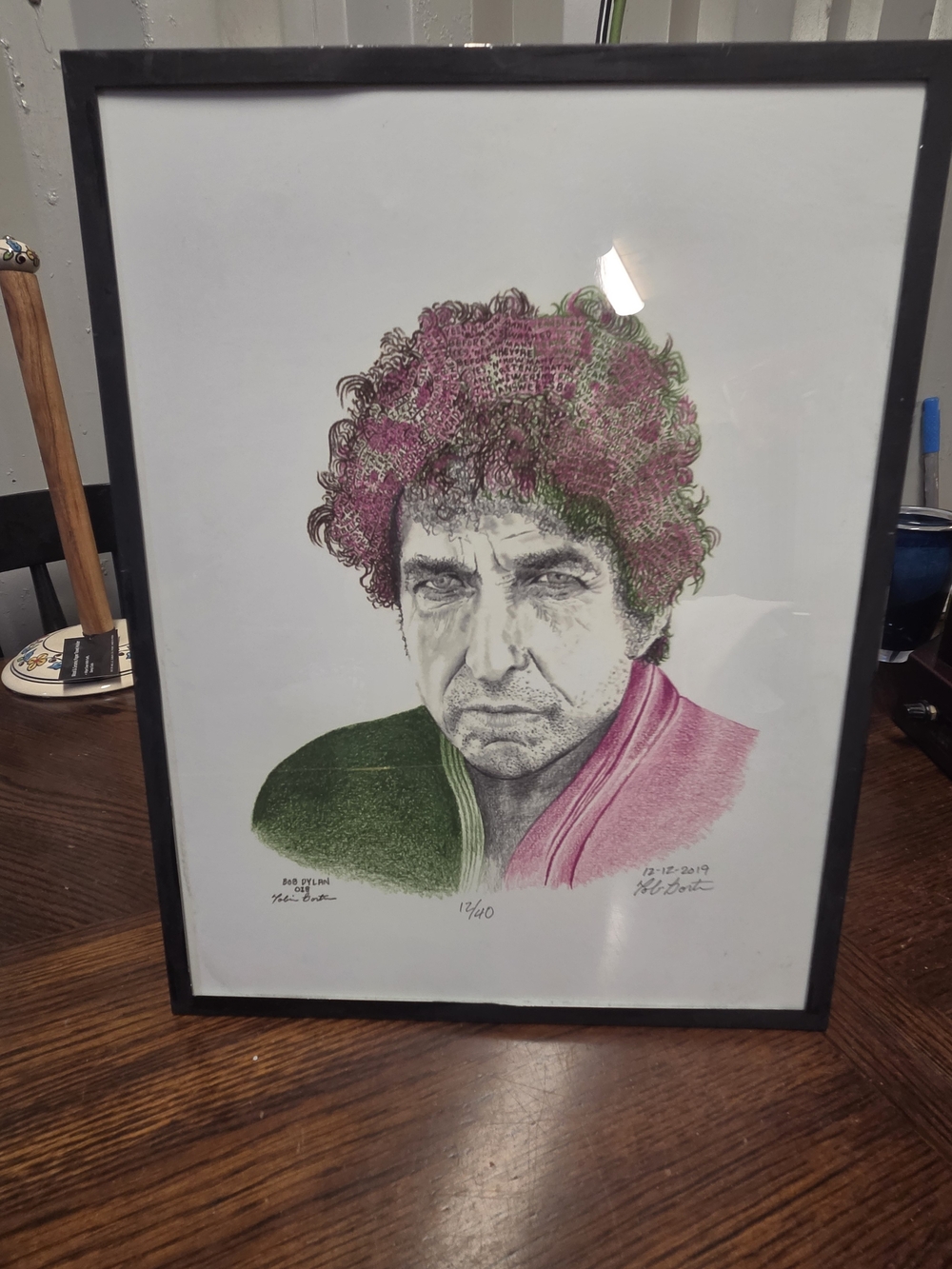 Framed artwork is a limited-edition Signed portrait iconic musician Bob Dylan